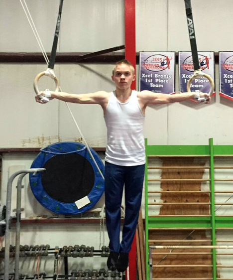 Going for gold -- Swanson practices on the rings at The American Gymnastics Training Center in Southington, Conn on April 1. He looks to focus on this event next year.