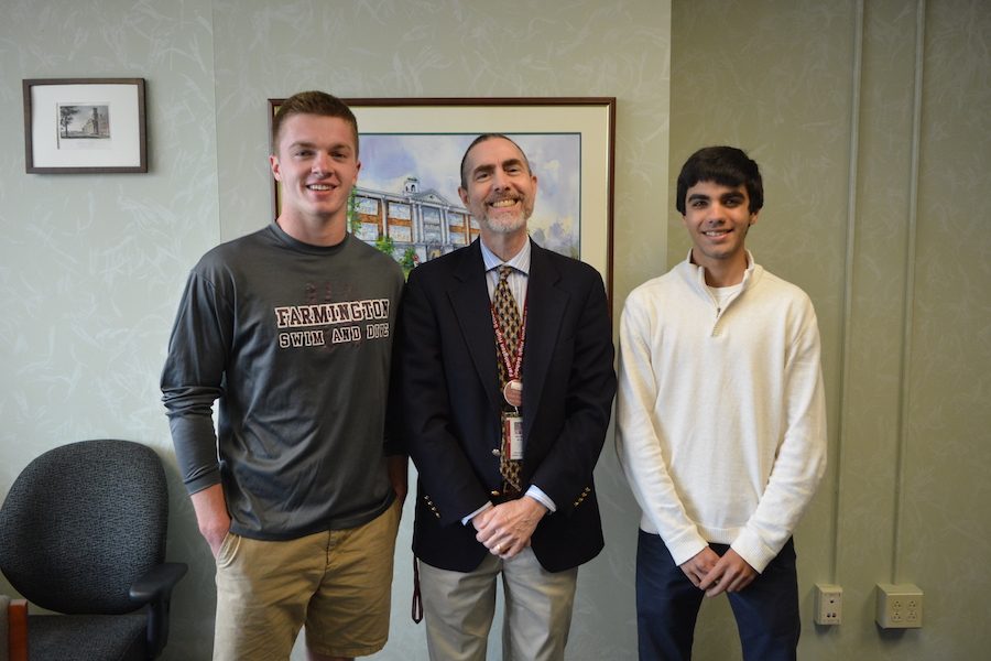 Straight A students-- Principal Bill Silva (center) congratulates salutatorian Andrew Deakin (left) and valedictorian Rahul Sindvani (right) on their academic success. Both Deakin and Sindvani will give speeches at graduation which will take place on the high school turf field on June 20.