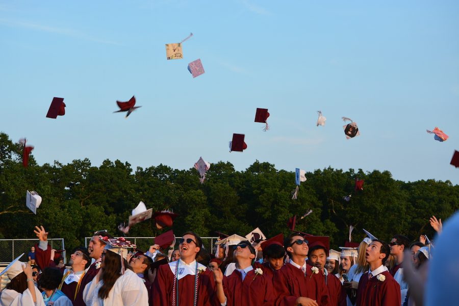 The Class of 2016 celebrates their graduation with the traditional the cap toss.
