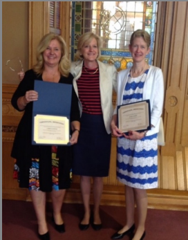 Celebrating a love of teaching and learning -- Music Department Chair Leslie Imse (center) is honored with Carrie Hammond (left) and Pamela Fisher (right) by the Connecticut Arts Administration Association. The music department was honored excellence in music