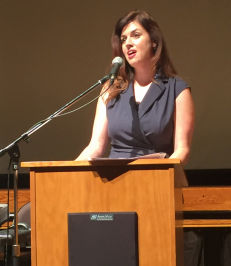 Inspiring with words-- 1998 Alumna Siobhan Oat-Judge speaks to seniors at the annual Senior Convocation. Currently, Oat-Judge is a Middle East advisor at the US Department of State.