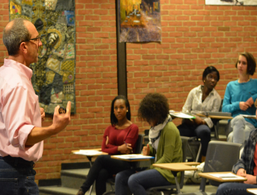 Psyched to learn-- Psychology teacher Michael Baxer lectures on inadequate retrieval cues to semester
one psychology students. Psychology is one of the second semester electives offered and is consistently a
popular choice amongst students, according to counselor Rebecca Gorman. 