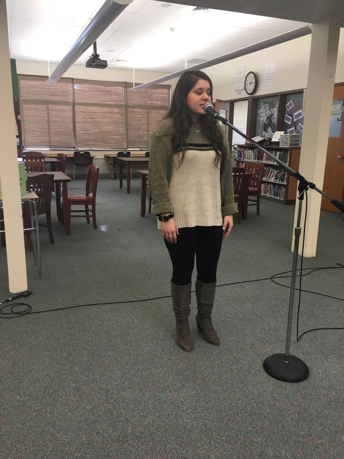 Mindful Monologue-- Senior Elena Jimenez-McDermott recites a passage from A Midsummer Night’s Dream. The competition was held in the library on February 13.