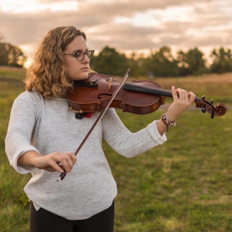 Vogler and her viola-- Senior Ashley Vogler plays her viola at Hillstead. She has been playing the viola the past three years in high school and has always had an inter-
est in music. Vogler centered her capstone around the music business industry.