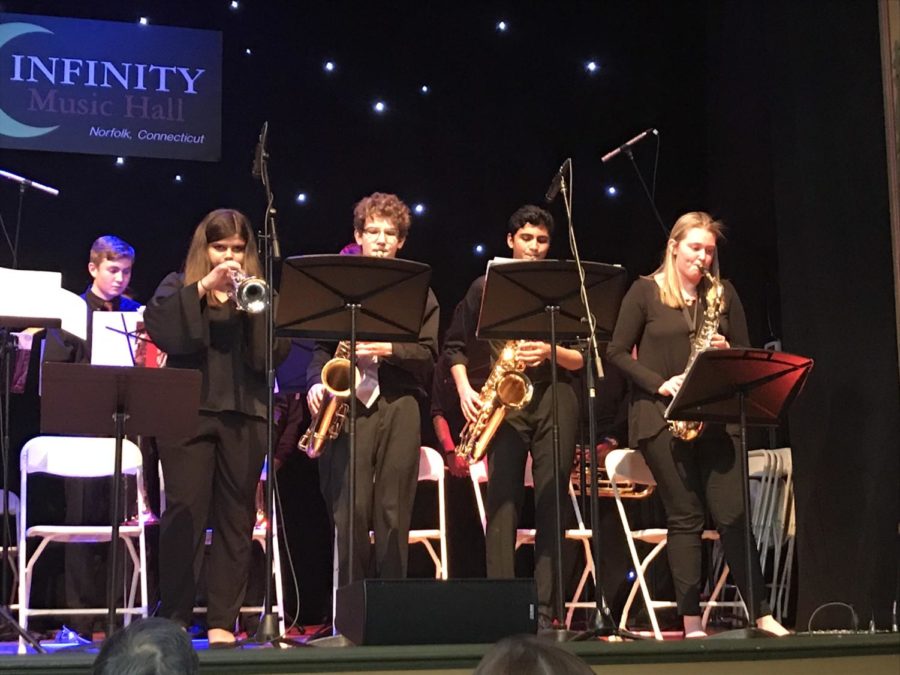 High notes-- Freshman Isabella Suffredini, sophomore Owen Tragash, junior Rohit Limaye, and junior Anna Saraceno play at the Southern New
England High School Jazz Festival. The event, which took place at Infinity Hall in Norwalk, raised 350 dollars for the band.