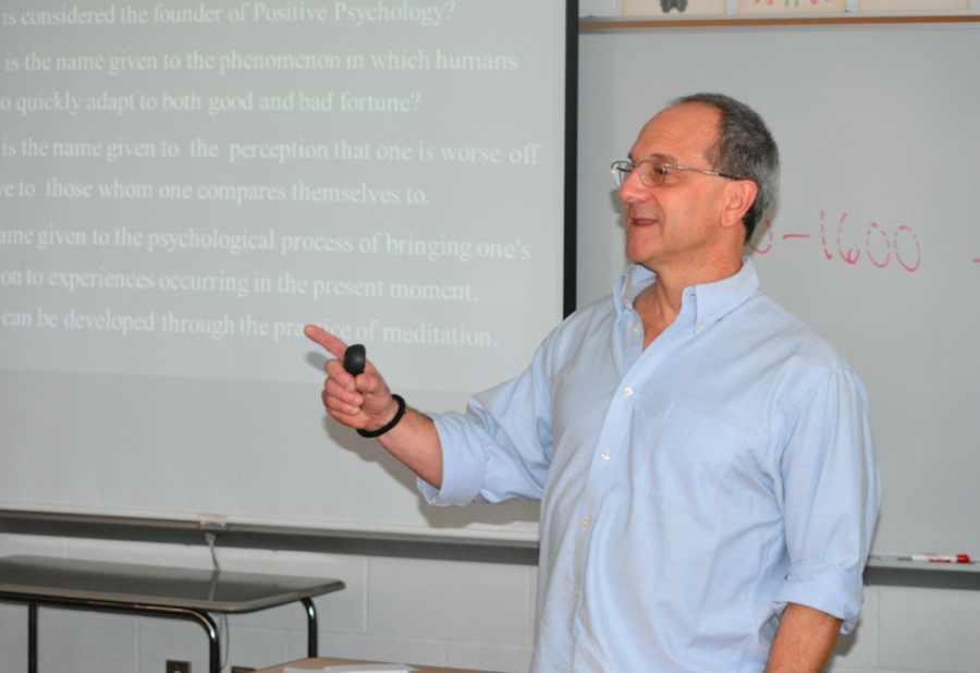 Serious about psychology -- Psychology and sociology teacher Mike Baxer teaches mindfulness to his first period Advanced Placement (AP) Psychology class. Baxer
was voted as the senior class graduation speaker. Graduation will take place at 6 p.m. on June 15 on the high school turf field.
