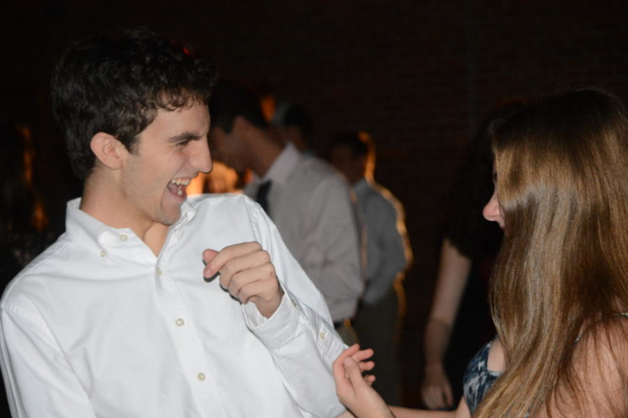 Homecoming+Fun--+Senior+John+Ruot+and+Junior+Carolyn+Ives+enjoy+the+festivities+at+the+homecoming+dance.+The+even+took+place+on+Saturday%2C+September+29.+