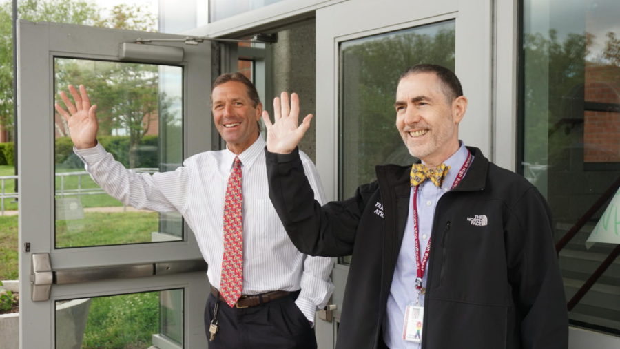 “You say ‘goodbye’ and I say ‘hello’”-- (left to right) Assistant Principal Curt Pandiscio and Principal Bill Silva greet students, faculty, and staff in the morning outside the Student Entrance of the high school. Both Pandiscio and Silva announced their retirement earlier this year.