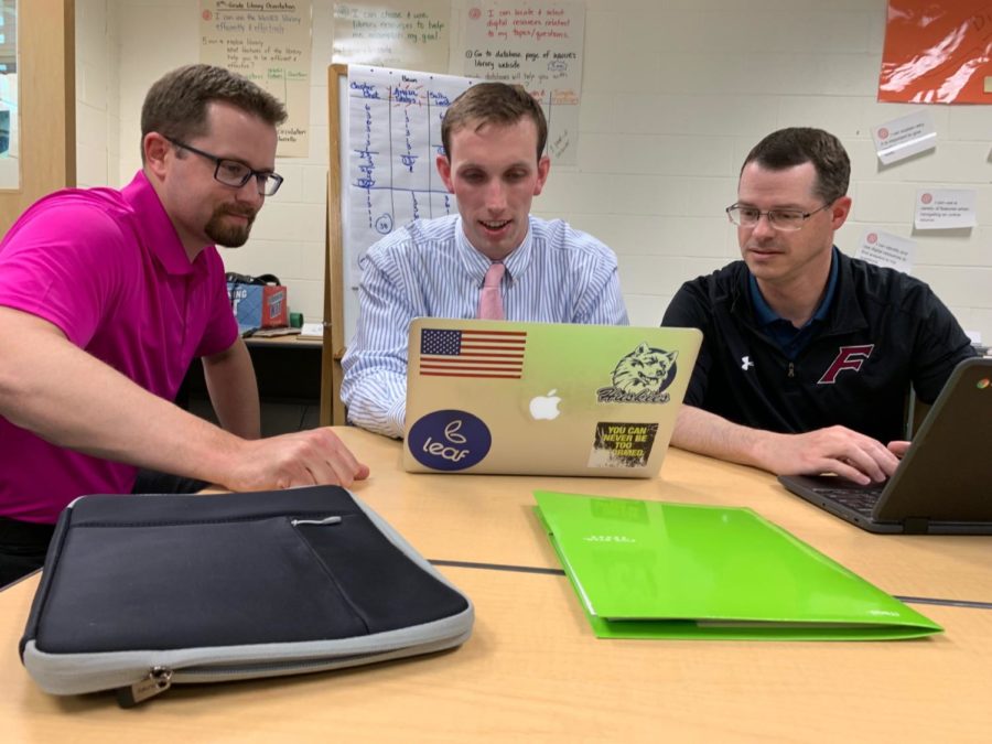 Future leaders-- (left to right) School counselor Chris Loomis, social studies teacher Patrick Mulcahy, and math teacher Jeff Dauphinais work together evaluating different school scenarios. The Sixth Year program at Central Connecticut State University (CCSU) is 30-credits and results in an Intermediate Administrative Certification (092).