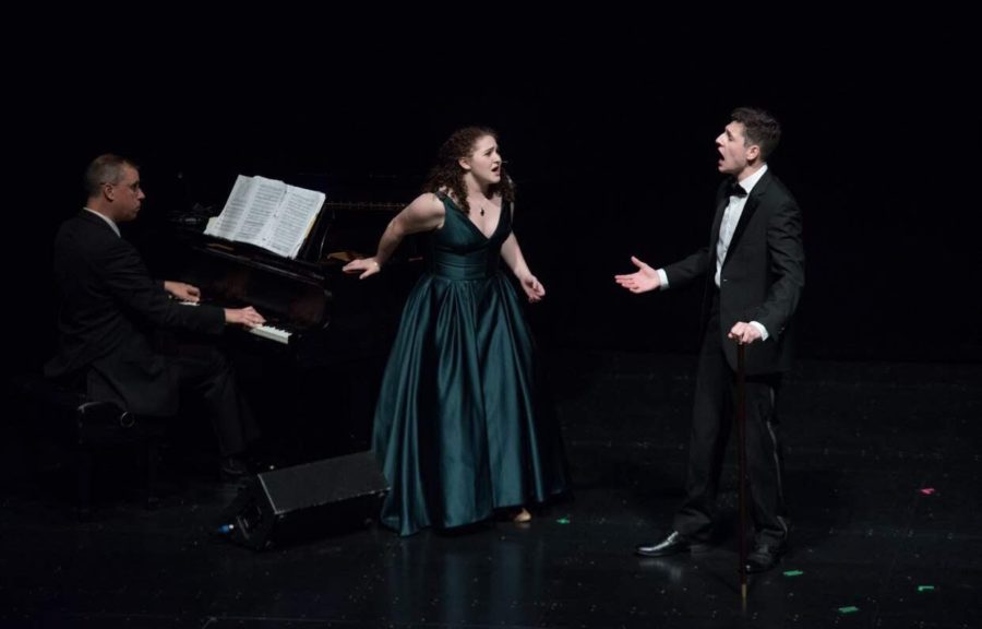 Perfect notes-- Senior Camille Hoheb (center) sings the song “Imponente” on stage in Belding Theater, which is located in Hartford. Hoheb will major in vocal performance at the University of Connecticut in the fall. 