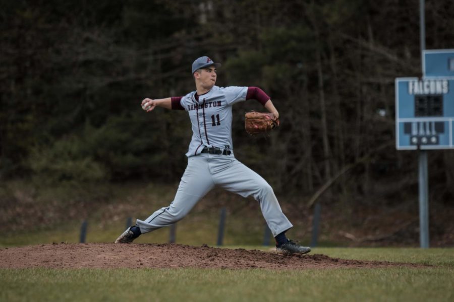 On the hill -- Junior Tyler Cortland fires a fastball in his game against Avon on May 1. Cortland pitched six and two thirds innings and struck five, propelling the
Indians to a 6-1 victory.