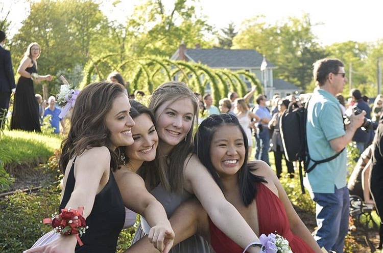 Formal wear -- (left to right) Seniors Sam Ruh, Steph Austin, Dayna Deakin, and Joanne Le take photos in Elizabeth Park in West Hartford, Connecticut prior to prom. Prom was held at the Hartford Marriott Downtown on May 18.