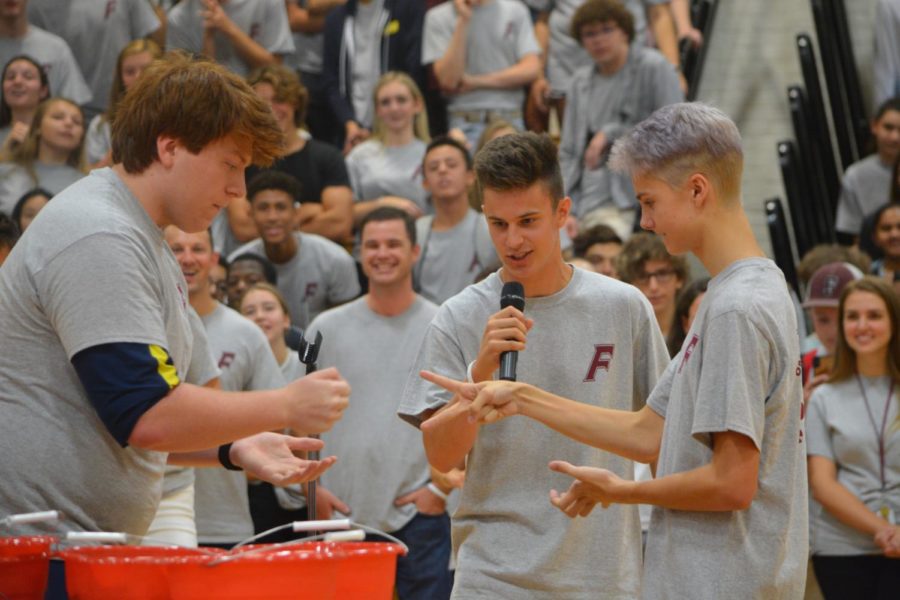 Final throw- Senior Anthony Seholm throws rock to defeat sophomore Sal Farrell in the championship matchup of the Rock, Paper, Scissors, Change tournament. This was the first time the school has held this challenge, and numerous staff members and students were impressed with the outcome.