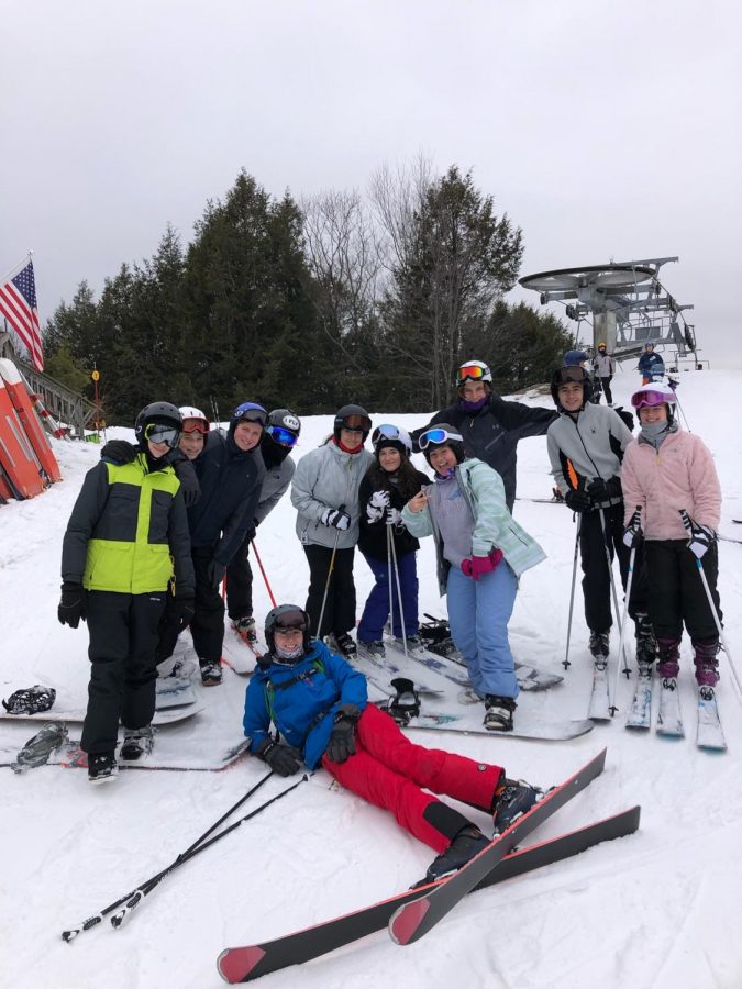 Hittin’ the Slopes-- Snowclub members pose for a photo after hours of fun skiing and snowboarding. The club spent the day at Berkshire East Ski Resort, as one of their trips as a club this winter. 
