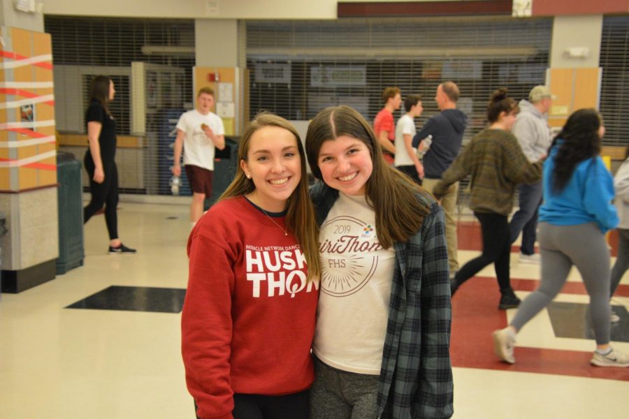 Photo+Op+--+Senior+Sarah+Hennig+%28right%29+and+2018+alumna+Ally+Dolmanisth+%28left%29+pose+for+a+picture+during+the+2020+Spirithon+event.+Members+of+the+club+celebrated+their+fundraising+efforts+with+a+celebration+on+Feb.+8+in+the+high+schools+cafe+and+gyms.+%0A