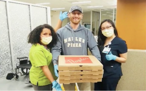 Courtesy of Fox News


A helping hand-- Naples owner Kurt Kruczek stands with two healthcare workers as he donates pizzas to local hospitals. Like many other restaurants, Kruczek is open for curbside pick-up during the COVID-19 pandemic. 