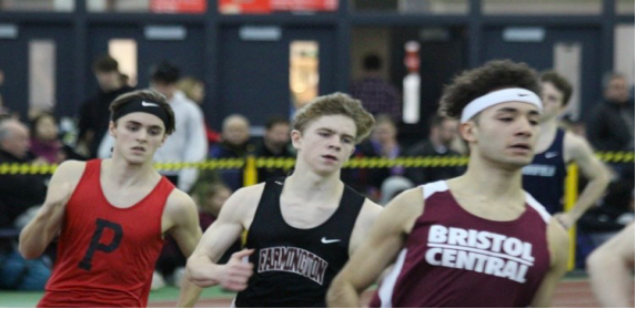 Running for the record -- Andrew Van De Mark (middle) competes in the 600 m race during the 2019 - 2020 season. Van De Mark
currently holds the school record for the event and earned the title of All-CCC athlete.