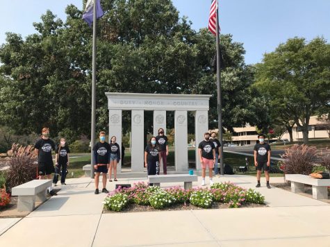 You can’t stop the music -- Choir students participate in a concert outside of the Town Hall Veteran memorial. Students and teachers in band,
choir, and orchestra have persevered to learn and teach during the pandemic.