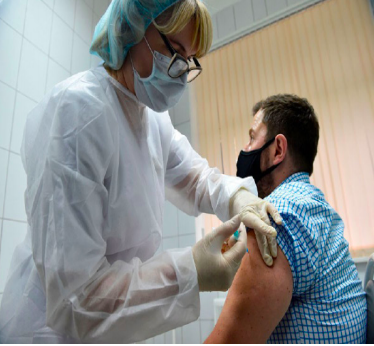 Vaccine progress-- A man receives his COVID-19 vaccine. The COVID-19 vaccine has
begun to roll out across the United States.