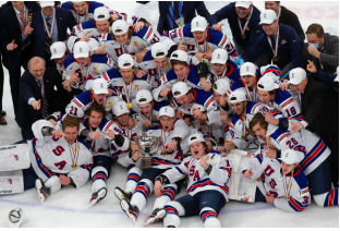 Bring Home the Gold-- USA celebrates their 2-0 upset over Canada in
the 2020 IIHF World Juniors Championship. The victory marks the fifth
IIHF World Junior Championship for the American team.