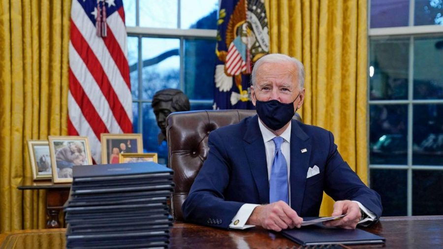Planning ahead-- President Joe Biden sits in the Oval Office signing executive orders with his administration. Biden was inaugurated into office alongside Vice
President Kamala Harris on January 20.
