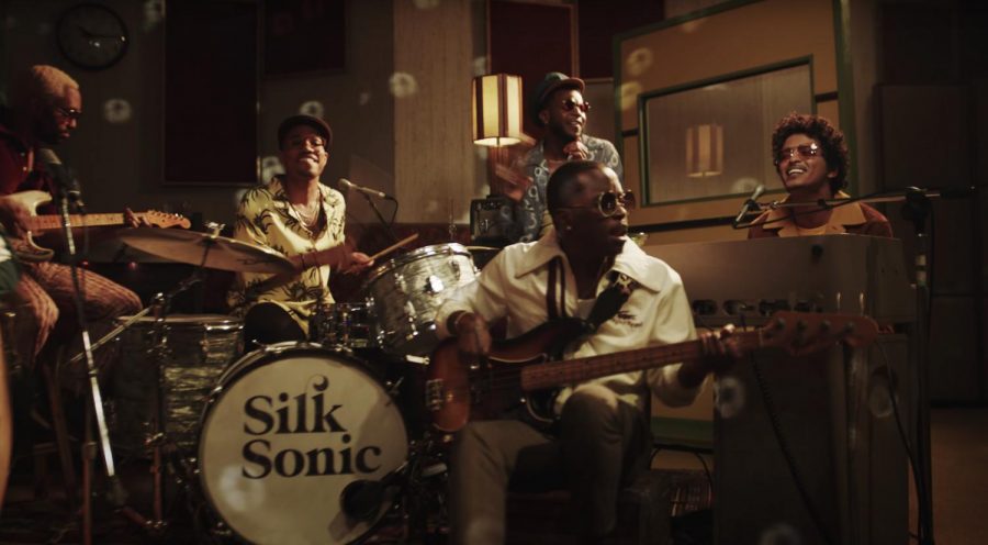 Walking through the Door: Bruno Mars (keyboard) and Anderson .Paak (drums) perform their new single “Leave the Door Open”. The two artists have joined forces to create the group “Silk Sonic”, an homage to the R&B and soul groups that acted as the primary influence for their musical passion. 
