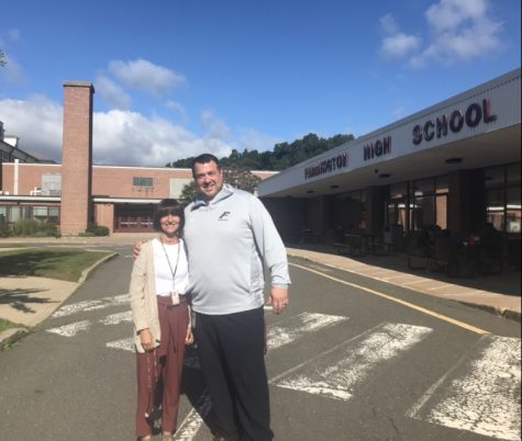 Side by side -- Athletic Director Matthew Martorelli (right) poses for a picture with assistant
Athletic Director Terri Escajeda (left) in front of the building taking a break from administrative
work in the athletic department. Martorelli joined the faculty in August for his first year as Athletic
Director.