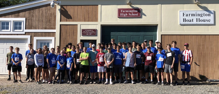Laura Butterfield 
Fast in water and on land — Members of the boys and girls crew team ran in the Rotary 5K race. The race started at the Tunxis Meade Boathouse, the teams’ home base and directed runners through the soccer fields and park at Tunxis.