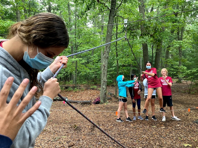 Bonding+on+the+ropes+--+The+Freshman+council+walks+on+wires+in+teams+of+two%2C+cheering+each+other+on+as+they+go.+Student+councils+went+on+a+field+trip+in+September.+