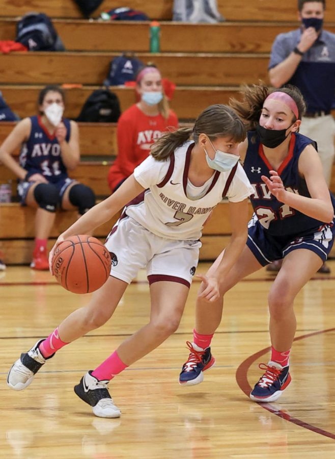 To the rack-- Senior Captain Daria Fournier driving to the hoop against Avon in the annual pink out game. Fournier will continue her basketball career at Eastern Connecticut State University. 