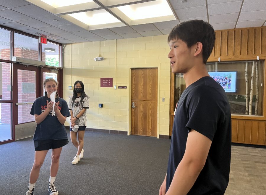 Speaking in front of you now -- Senior Andy Dong gives advice to middle school students as he guides them through the high school. Dong was named Valedictorian and will deliver a speech in front of his peers during graduation on June 14. 