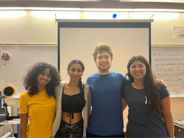Say “cheese--Tri-M officers  (from left to right) Divya Saravanan, Ria Verma, Tyler Hodgman, and Safia Lee standing together in the band room. They have recently begun brainstorming and planning ideas for another successful  school year for the music honor society. 