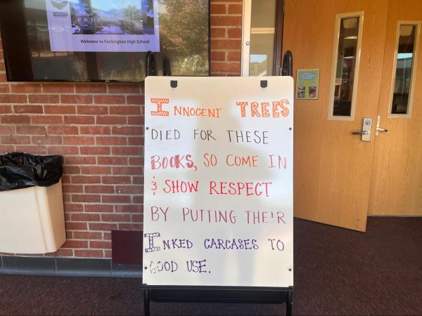 Come on in! -- The whiteboard stationed in front of the library is a friendly greeting for passerby students. The whiteboard has been getting a regular update with witty sayings encouraging students to stop in and see what’s new. 