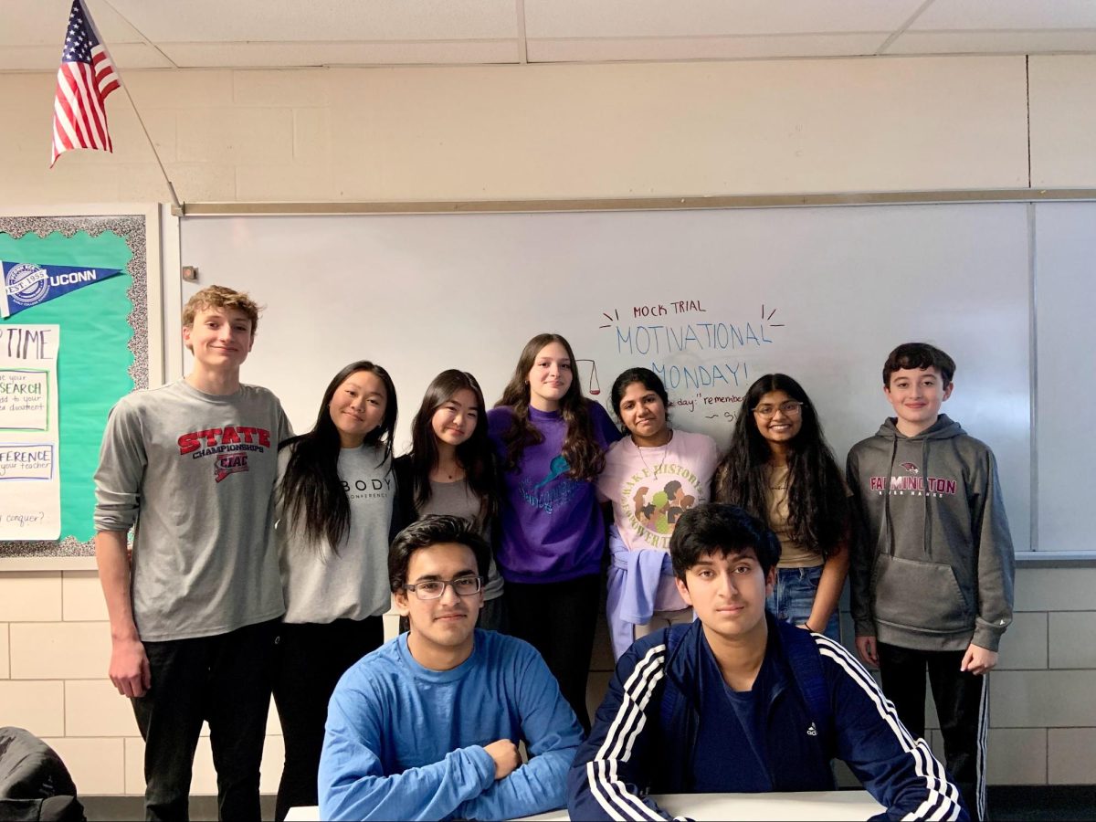 Scrimmage for success–Members of the FHS mock trial club gather for a group picture after their meeting. On December 7, 2023, members of the team participated in a scrimmage to prepare for their upcoming tournament.