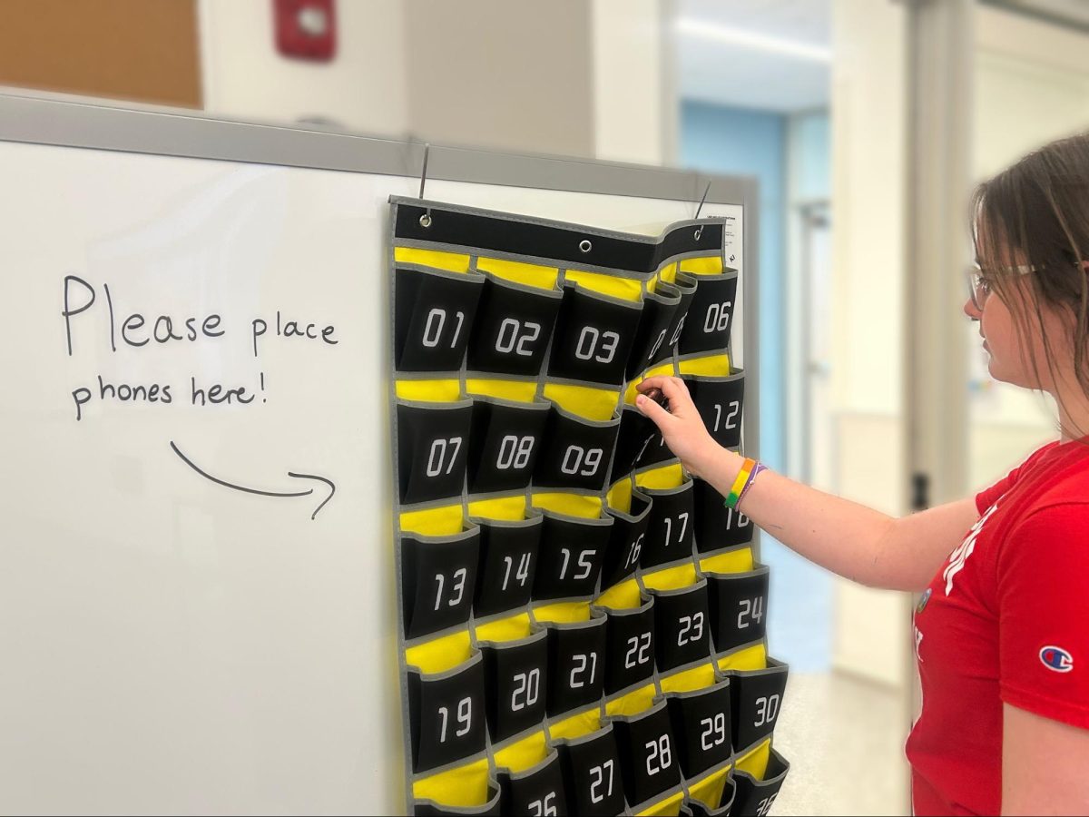 Checked in! -- Throughout Farmington High School (FHS) students are placing their phones into an assigned pocket at the beginning of class to take a “vacation” during class time. These “phone hotels” have recently been implemented in an effort to curb digital distractions from class time learning.