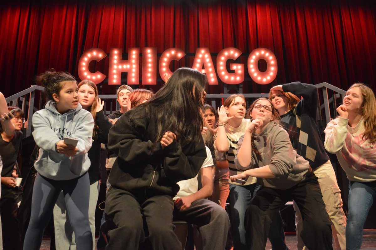 “Foxy, Roxie Hart!”--Junior Stella Huang stars as Roxie Hart in the FHS Drama Club’s production of Chicago: Teen Edition. The show, which opened on March 14, 2025, had a successful three night run at Farmington High School. 